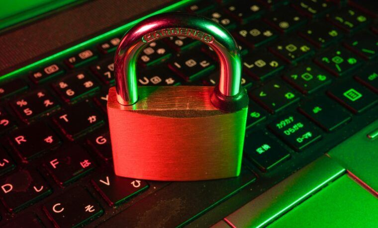 Laptop screen with a padlock symbol representing WordPress website security